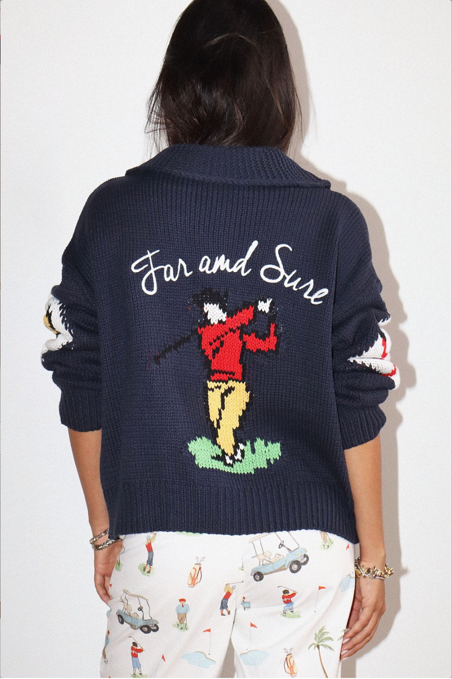 HOLE IN ONE ZIP SWEATER