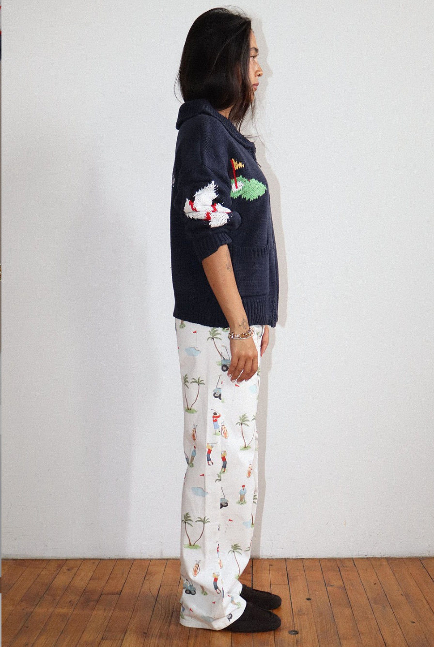 HOLE IN ONE ZIP SWEATER