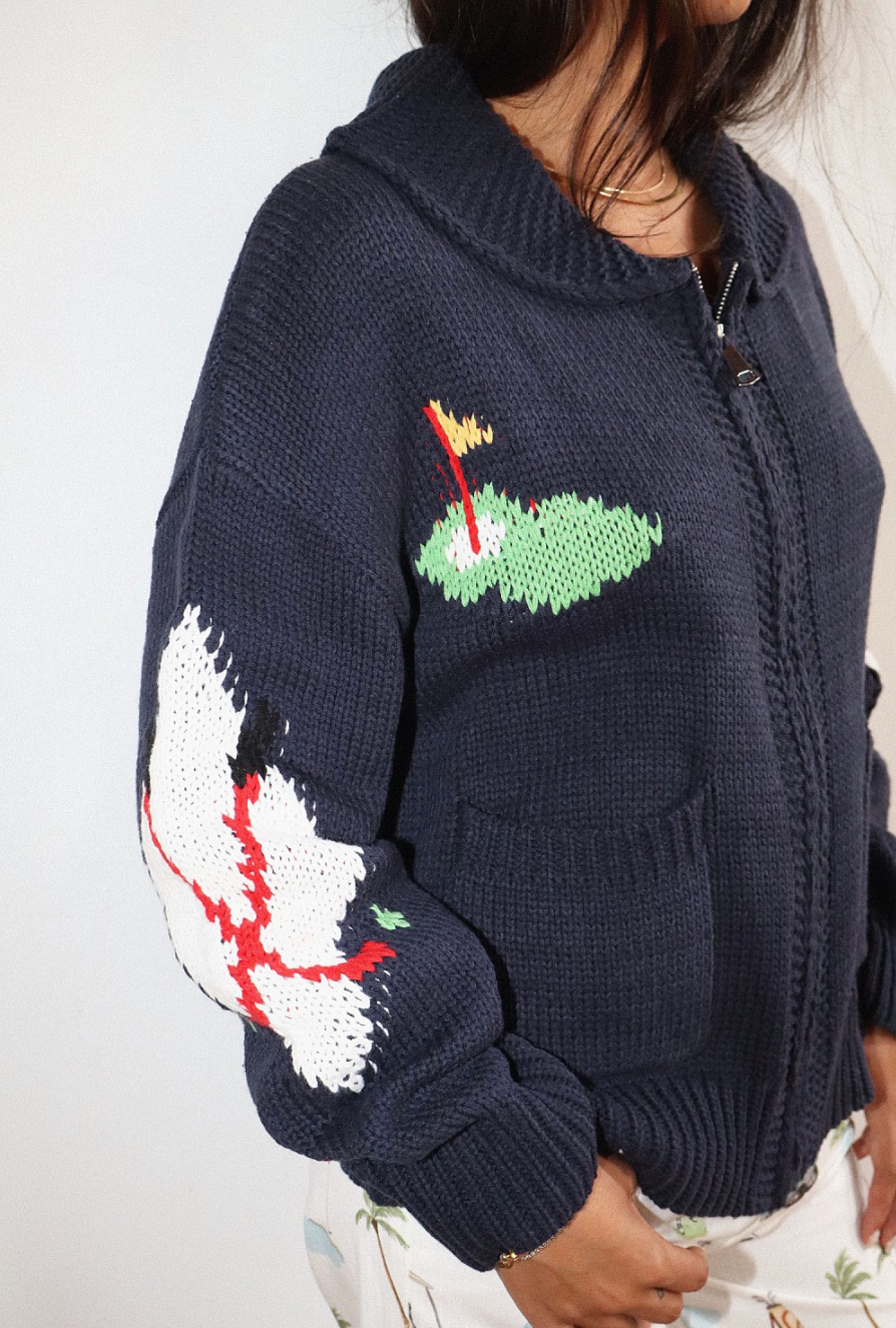 HOLE IN ONE ZIP SWEATER