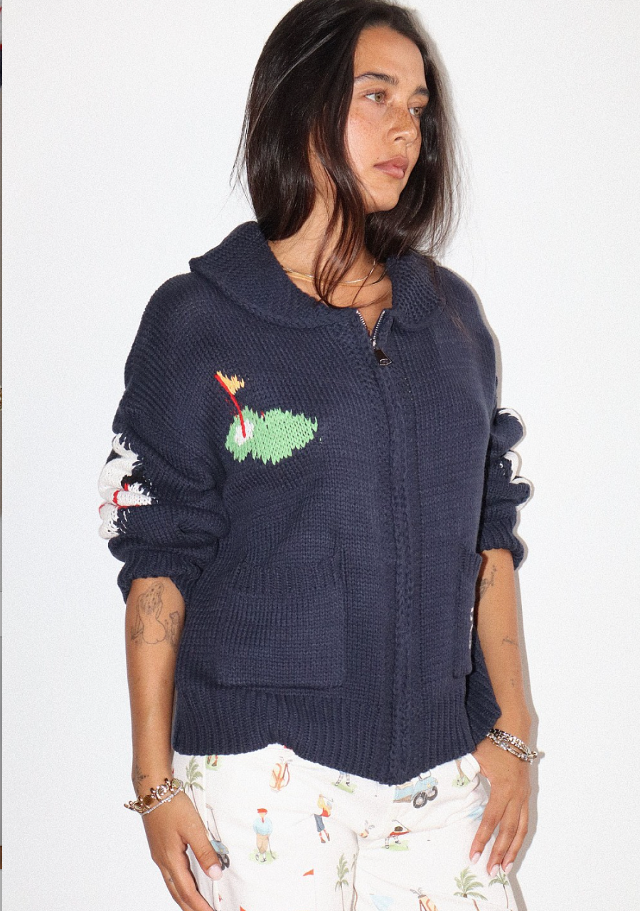 HOLE IN ONE ZIP SWEATER